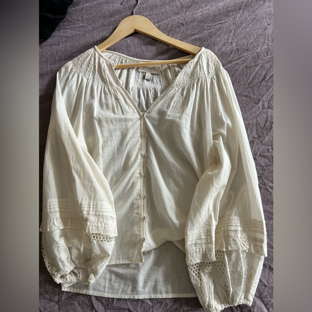Bell sleeved. Peasant top. Never worn.